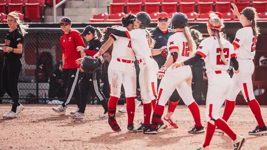 Red Raiders celebrate Arriana Villa's walk off single against UIW