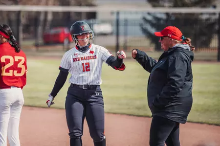 Ellie Bailey celebrates an RBI single against Iowa State