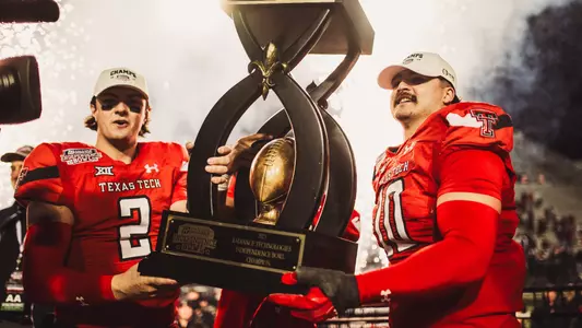 Behren Morton, Jacob Rodriguez Independence Bowl Trophy