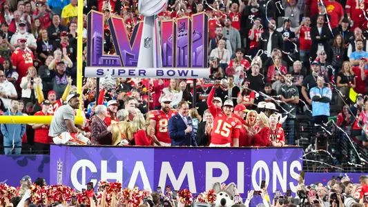 Feb 11, 2024; Paradise, Nevada, USA; Kansas City Chiefs quarterback Patrick Mahomes (15) hoists the Vince Lombardi Trophy after defeating the San Francisco 49ers in Super Bowl LVIII at Allegiant Stadium. Mandatory Credit: Stephen R. Sylvanie-USA TODAY Sports
