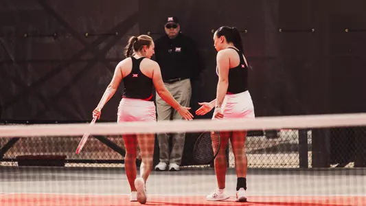 Komac and Sayfetdinova