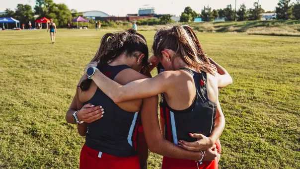 Women's cross country huddle