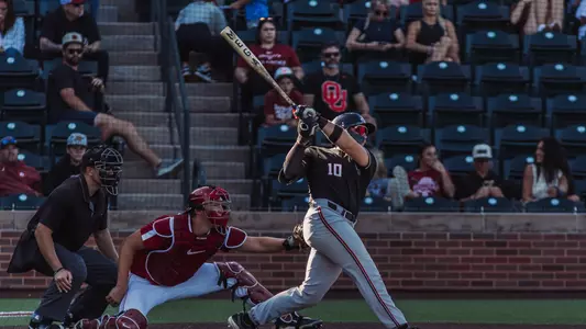 First Team All-Big 12 OF Logan Hughes takes a swing in a Fall Scrimmage against Oklahoma.