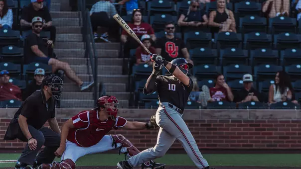 First Team All-Big 12 OF Logan Hughes takes a swing in a Fall Scrimmage against Oklahoma.