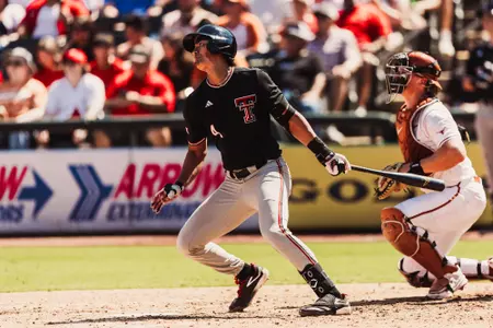 Linkin Garcia (4) takes a swing in Texas Tech's Fall Exhibition game against Texas.