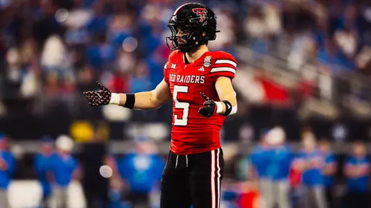 Texas Tech senior Cole Wisniewski points out the coverage in the Big 12 Championship title game versus BYU