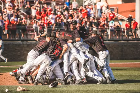 The 2018 Texas Tech Baseball Team, Dog Piles after advancing to the 2018 College World Series.