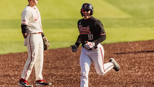 Logan Hughes rounds the bases after one of his two home runs during the 2026 Texas Tech Baseball Alumni Game