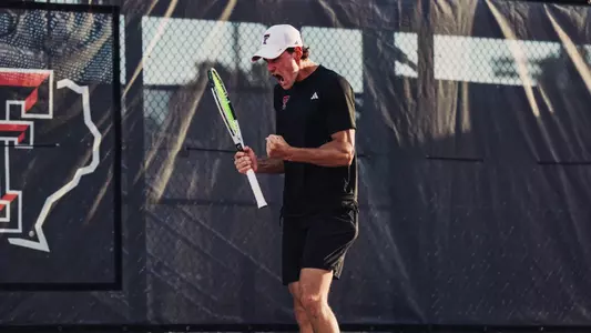 Niksa Arsic celebrates in match vs. Baylor
