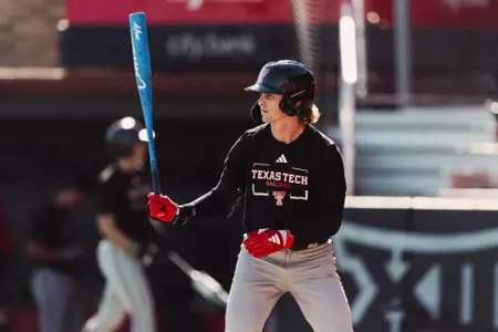 Ashton Larson digs in from the left side for an at-bat during a Fall Ball scrimmage
