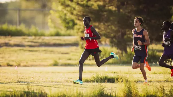 Titus Kimaru running at the Texas Tech Open cross country meet