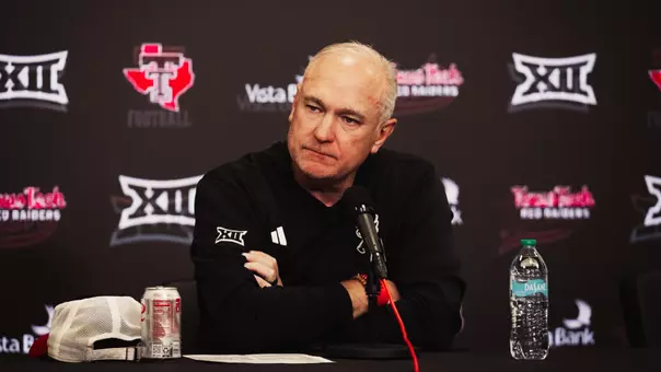 Joey McGuire listens to a reporter's question during his postgame press conference after Texas Tech's win over Arizona State.