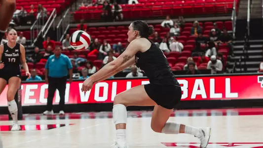Elia Dinsmore digging out a ball for Texas Tech volleyball