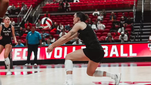 Elia Dinsmore digging out a ball for Texas Tech volleyball