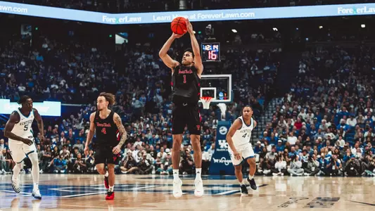 Damarion Dennis puts up a shot against Kentucky in an exhibition game at Rupp Arena.