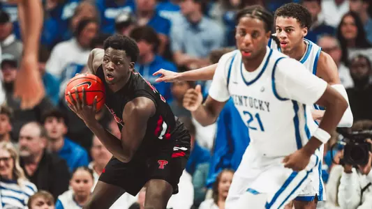 Bassala Bagayoko grabs a rebound against Kentucky in an exhibition game against Kentucky.