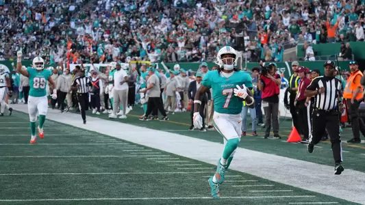 Miami Dolphins wide receiver Caleb Douglas (7) stays in bounds and avoids New York Jets safety Minkah Fitzpatrick (29) for a touchdown reception during the second half at MetLife Stadium.