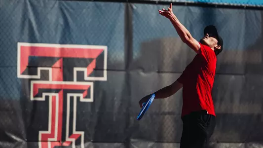 Joseph Patton Prepares to Serve the Tennis Ball