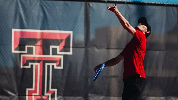 Joseph Patton Prepares to Serve the Tennis Ball