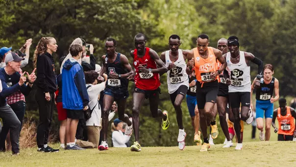 Titus Kimaru running in the middle of the pack at the Big 12 Cross Country Championships