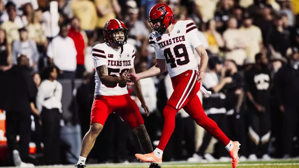 Will Karoll celebrates with Rylan Vagana after his punt was downed at the 2-yard line during Texas Tech's win at Colorado.