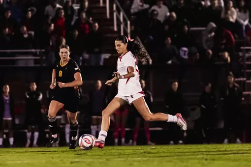 Lauren Alvarez dribbles past an ASU defender with the ball on her right foot during an Oct. 2nd match