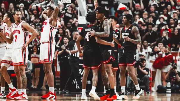 JT Toppin and Christian Anderson gather together in the lane after a basket against Houston.