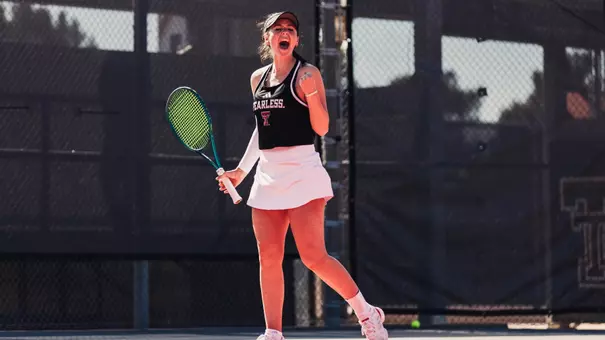 Hailey Murphy celebrating after winning a point. Texas Tech vs Oregon Womens's Tennis on February 1st, 2026 in Lubbock, TX. (Photo by Rane Paulson/Texas Tech Athletics)