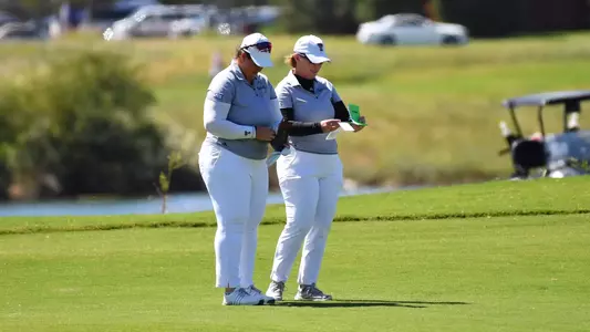 Lauren Zaretsky and Coach JoJo Robertson think shot selection on the course