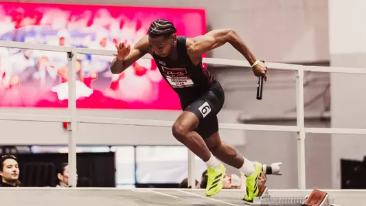 Shaemar Uter running out of the blocks as the first leg of the 4x400 relay