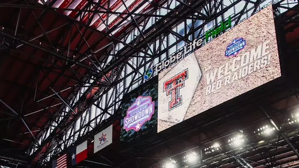 The 3D Beveled "Double-T" on home plate appears on the video board at Globe Life Field (Home of the Texas Rangers) for Thursday's practice day prior to the 2026 Shriners Children's College Showdown.