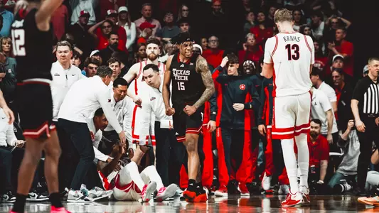 JT Toppin flexes after making a basket against No. 1 Arizona.