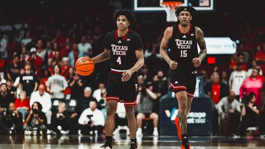Christian Anderson brings the ball up the court with JT Toppin trailing him in Tech's win over No. 1 Arizona.