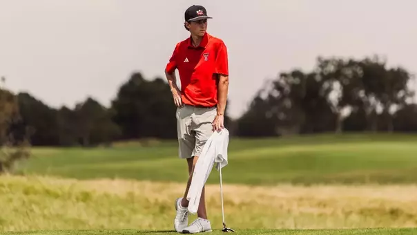 Price Hill waits to putt during practice round at the Rawls Course