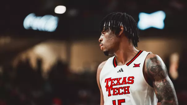 JT Toppin looks toward his team during a game.