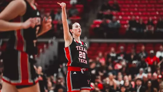Bailey Maupin follow through after shooting a three.