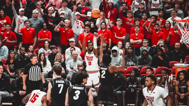 Donovan Atwell shoots a 3-pointer against Colorado.
