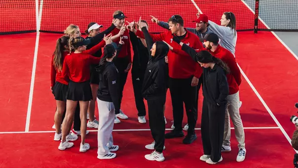 The Lady Raiders huddle up after the match win. Texas Tech vs Sam Houston State Women's Tennis on February 1st, 2026 in Lubbock, TX. (Photo by Rane Paulson/Texas Tech Athletics)