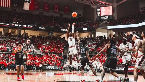 Donovan Atwell shoots a 3-pointer in Tech's win over K-State.