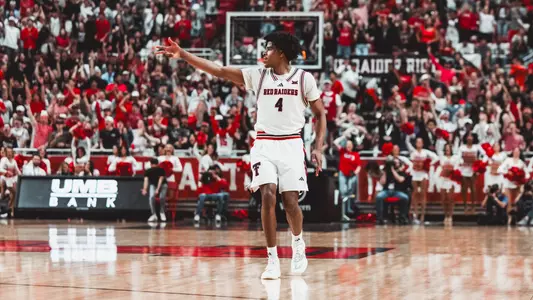 Christian Anderson celebrates after making a 3-pointer against Cincinnati.