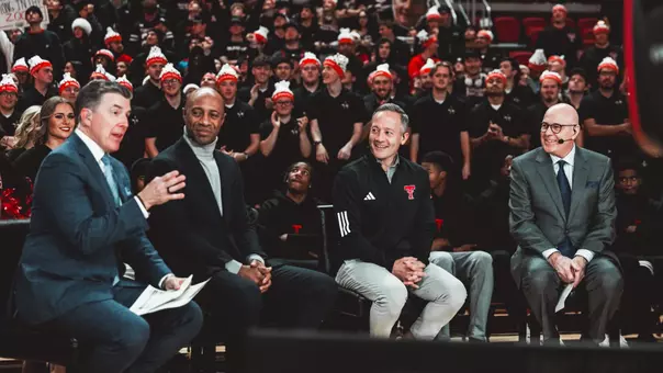 Grant McCasland visits with the ESPN College GameDay crew during a pregame show in Lubbock.