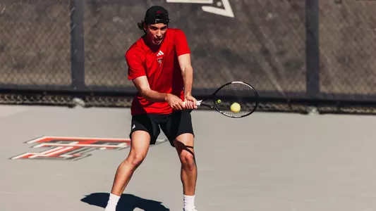 Bautista Leguizamon hitting a backhand in the match. Texas Tech vs Oral Roberts Men’s Tennis on February 26, 2026 in Lubbock, TX. (Photo by Jacob Reiner/Texas Tech Athletics)