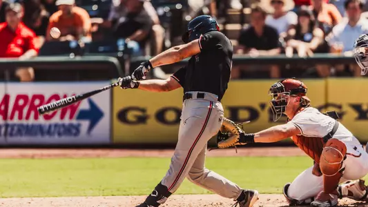 Texas Tech Grad Student Robin Villeneuve takes a swing during an at-bat in the Red Raiders fall contest against Texas in Round Rock.