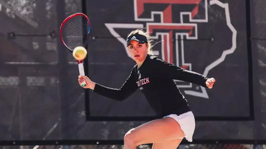 Ella Brownback hitting a slicer. Texas Tech vs Oregon Womens's Tennis on February 1st, 2026 in Lubbock, TX. (Photo by Rane Paulson/Texas Tech Athletics)