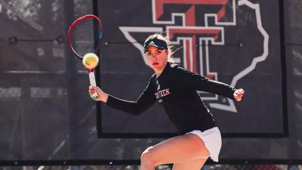 Ella Brownback hitting a slicer. Texas Tech vs Oregon Womens's Tennis on February 1st, 2026 in Lubbock, TX. (Photo by Rane Paulson/Texas Tech Athletics)