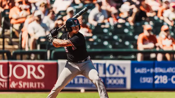 C Matt Quintanar digs in for an at-bat during a fall ball game against the University of Texas in Round Rock