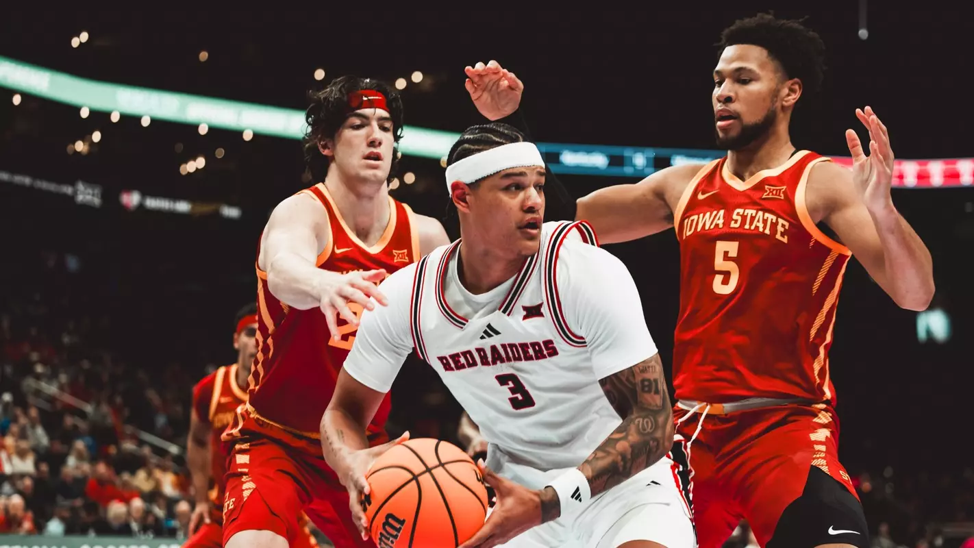 LeJuan Watts looks for room to work against the Iowa State defense.