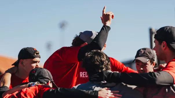 Pre match huddle with a guns up