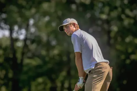 Connor Graham lines up a tee shot at the OFCC/Fighting Illini Invitational