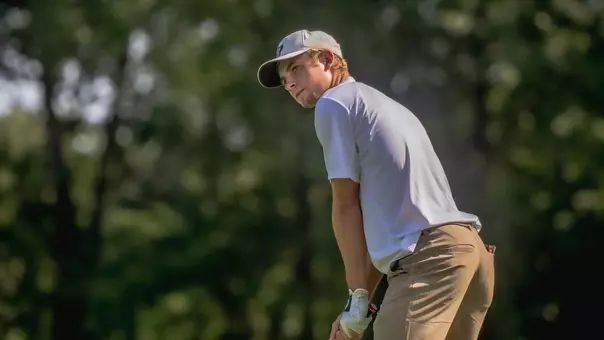 Connor Graham lines up a tee shot at the OFCC/Fighting Illini Invitational